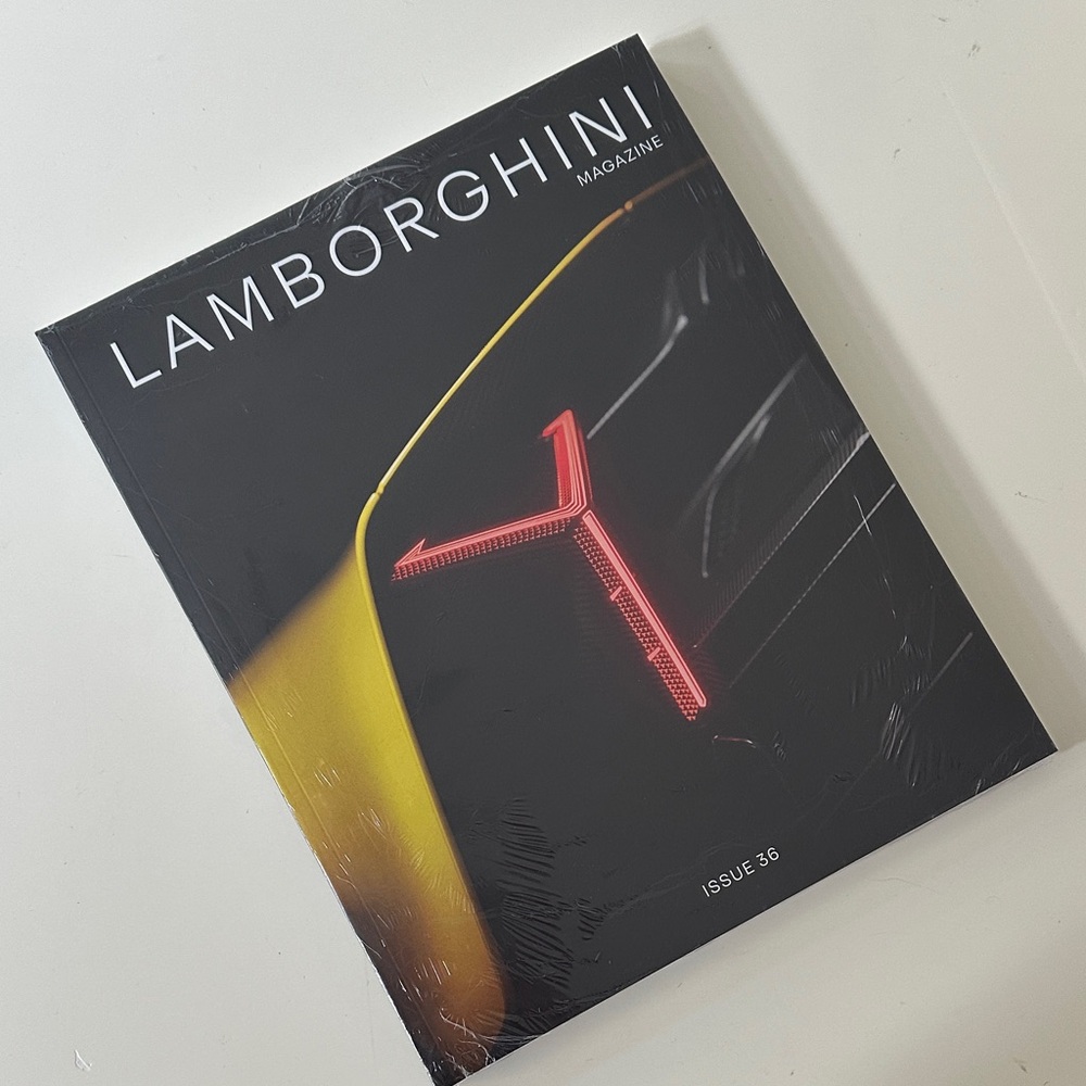 Lamborghini Magazine with Red and Yellow Highlights